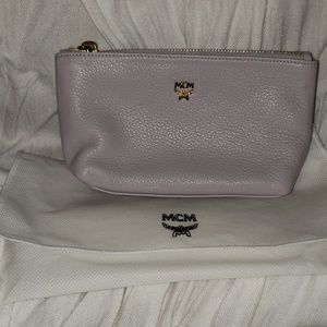MCM small cosmetic bag price is firm